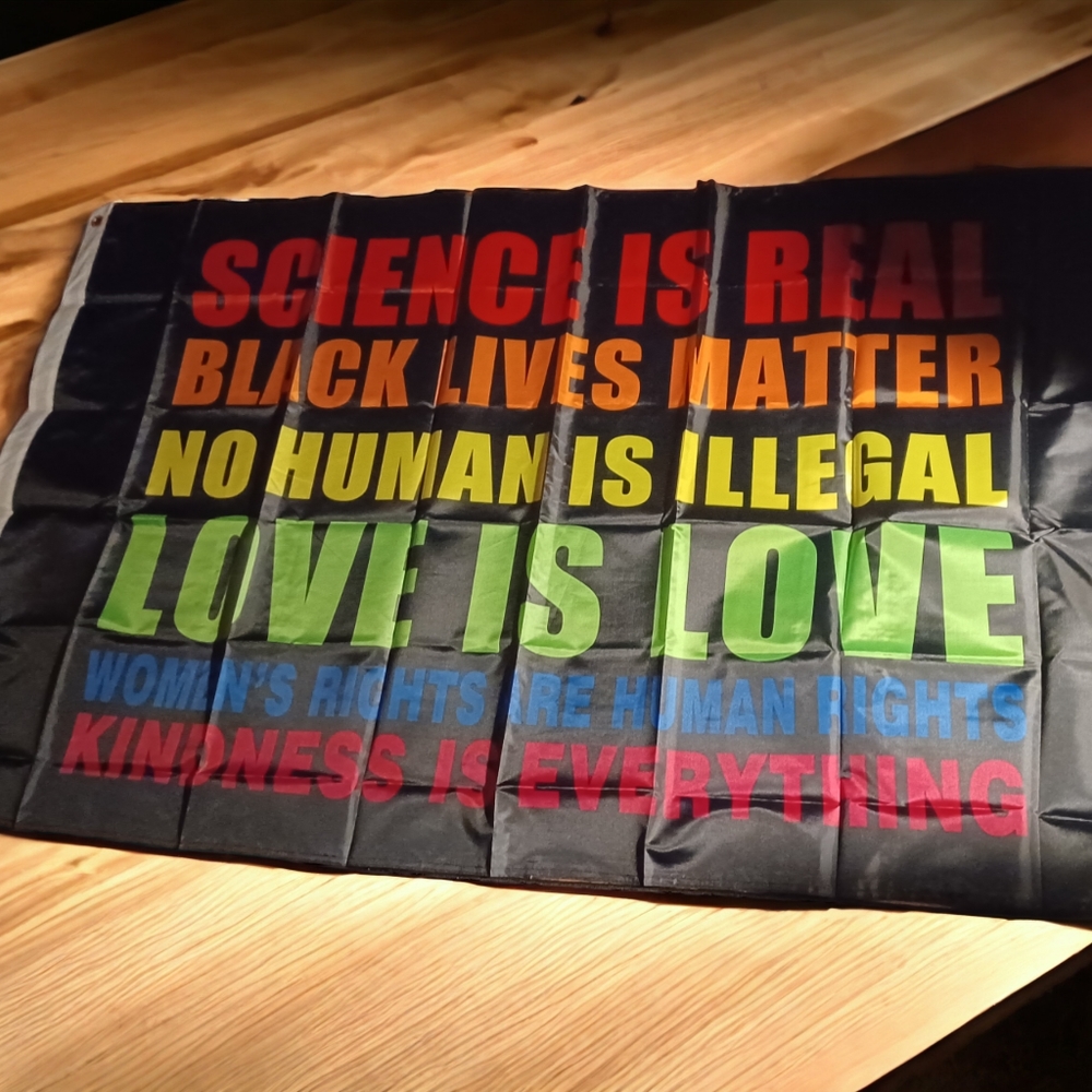 Woke statement wall flag new